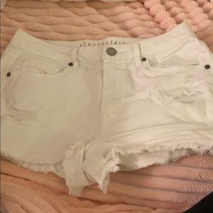 White high waisted shorts with rips